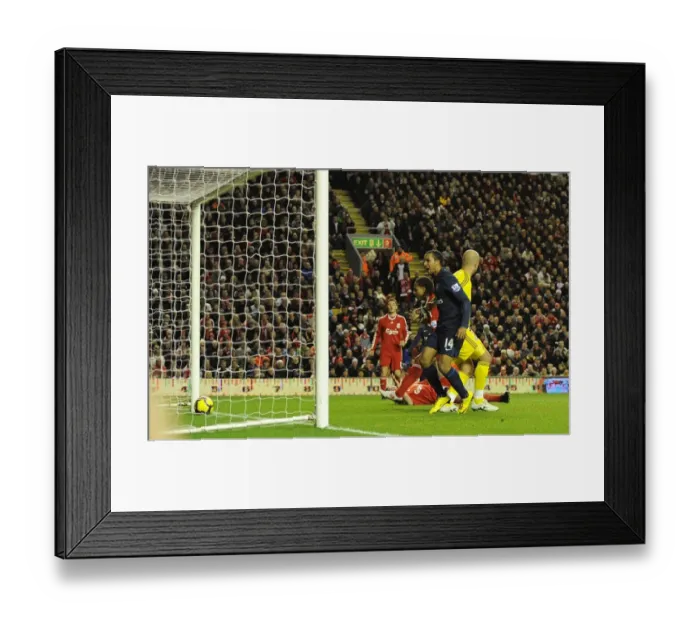 Framed Print : Theo Walcott looks on as Glen Johnson put through his own net for the 1st Arsenal goal