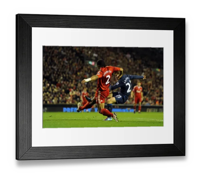 Framed Print : Andrey Arshavin shoots past Glen Johnson to score the 2nd Arsenal goal