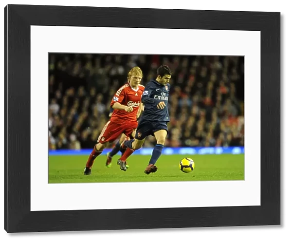 Cesc Fabregas (Arsenal) Dirk Kuyt (Liverpool). Liverpool 1: 2 Arsenal, Barclays Premier League