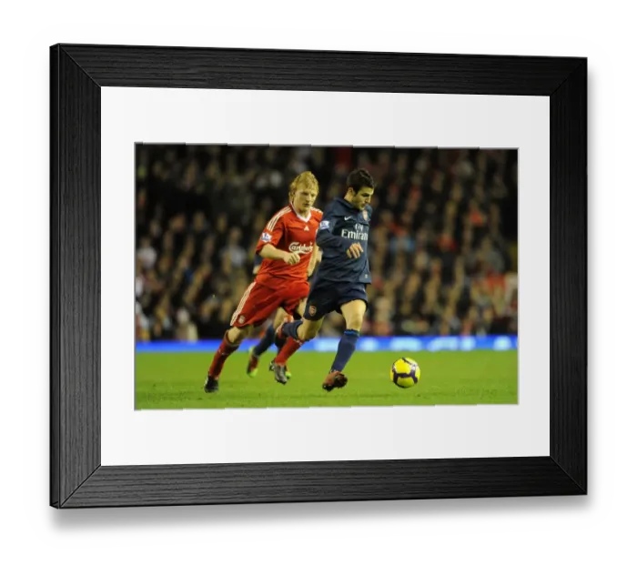 Framed Print : Cesc Fabregas (Arsenal) Dirk Kuyt (Liverpool). Liverpool 1: 2 Arsenal, Barclays Premier League Framed Print : Cesc Fabregas (Arsenal) Dirk Kuyt (Liverpool). Liverpool 1: 2 Arsenal, Barclays Premier League