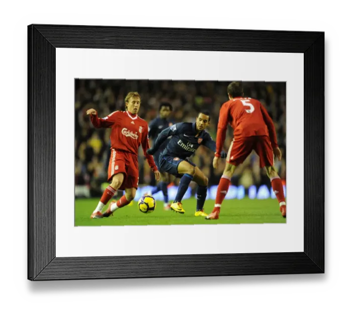 Framed Print : Theo Walcott (Arsenal) Lucas and Daniel Agger (Liverpool). Liverpool 1: 2 Arsenal