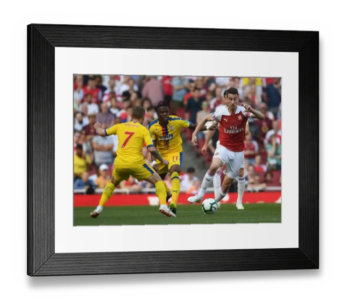 Framed Print : Arsenal vs Crystal Palace: Koscielny vs Zaha Clash in Premier League Showdown Framed Print : Arsenal vs Crystal Palace: Koscielny vs Zaha Clash in Premier League Showdown