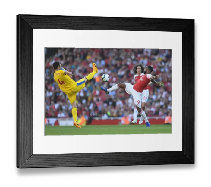 Framed Print : Clash at the Emirates: Lacazette vs. Milivojevic Framed Print : Clash at the Emirates: Lacazette vs. Milivojevic