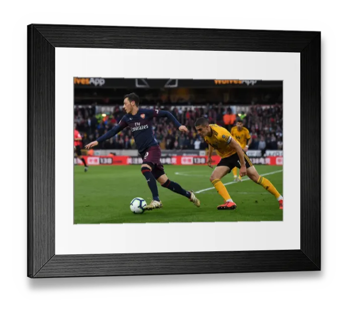 Framed Print : Mesut Ozil vs. Conor Coady: Battle at Molineux - Wolverhampton Wanderers vs. Arsenal FC, Premier League 2018-19