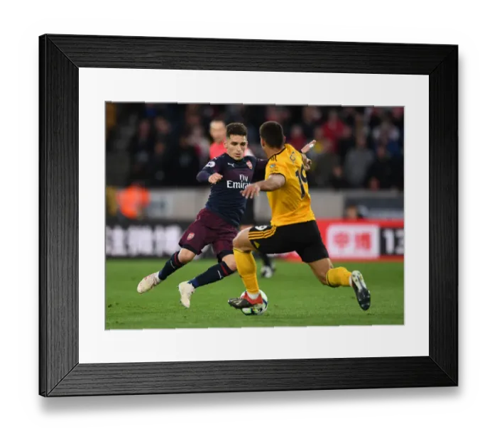 Framed Print : Torreira vs Jonny: Intense Clash Between Wolverhampton and Arsenal in Premier League