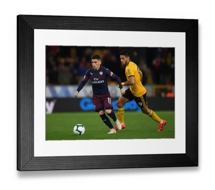 Framed Print : Torreira vs. Jimenez: Intense Battle in Wolverhampton Wanderers vs. Arsenal FC Premier League Clash