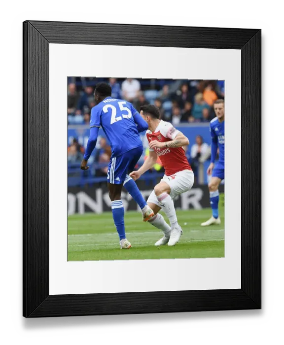 Framed Print : Clash of Midfield Titans: Xhaka vs Ndidi in Leicester City vs Arsenal FC Framed Print : Clash of Midfield Titans: Xhaka vs Ndidi in Leicester City vs Arsenal FC