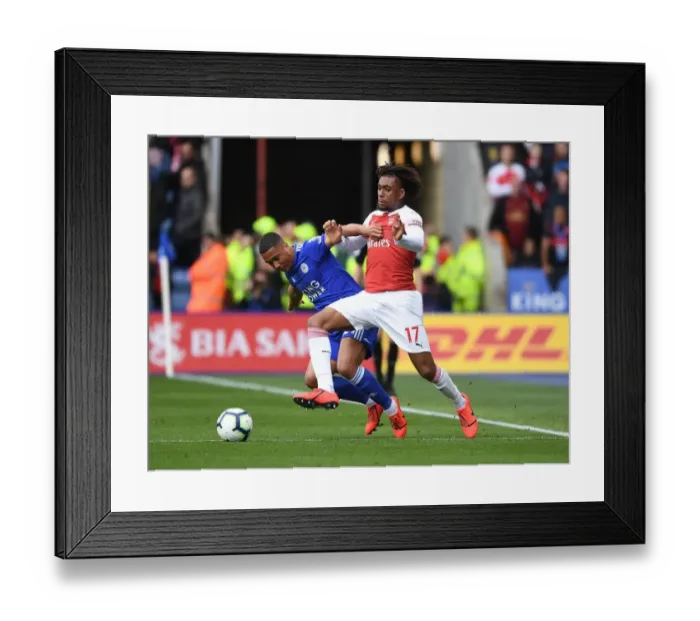 Framed Print : Arsenal's Alex Iwobi Outsmarts Tielemans: A Premier League Battle of Wits (Leicester vs Arsenal, 2018-19)
