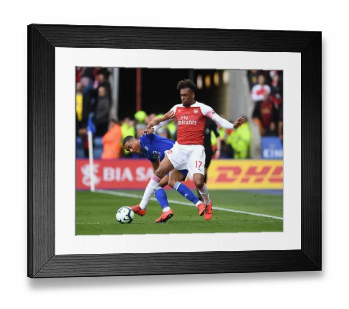 Framed Print : Arsenal's Alex Iwobi Outsmarts Tielemans: A Premier League Tactical Showdown - Arsenal vs. Leicester