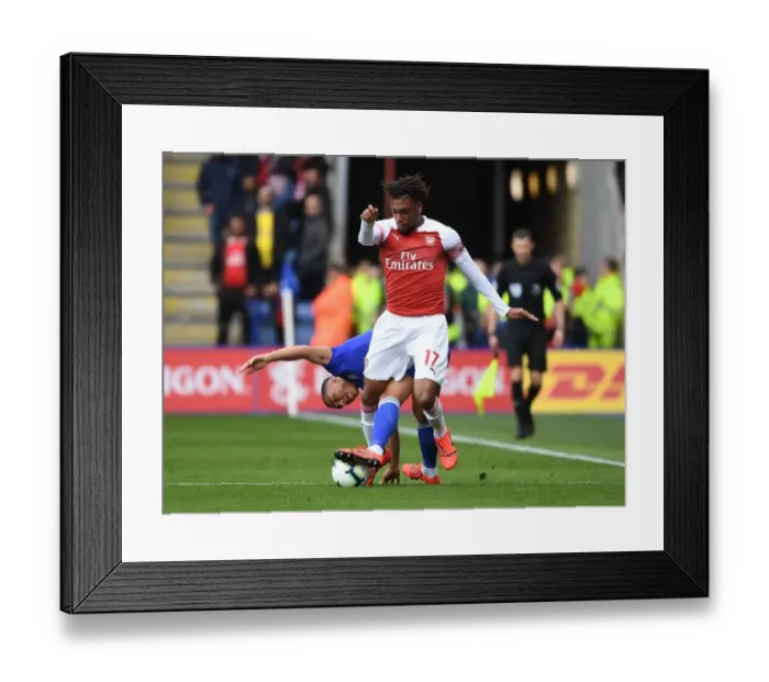 Framed Print : Arsenal's Alex Iwobi Outmaneuvers Leicester's Youri Tielemans in Premier League Clash Framed Print : Arsenal's Alex Iwobi Outmaneuvers Leicester's Youri Tielemans in Premier League Clash