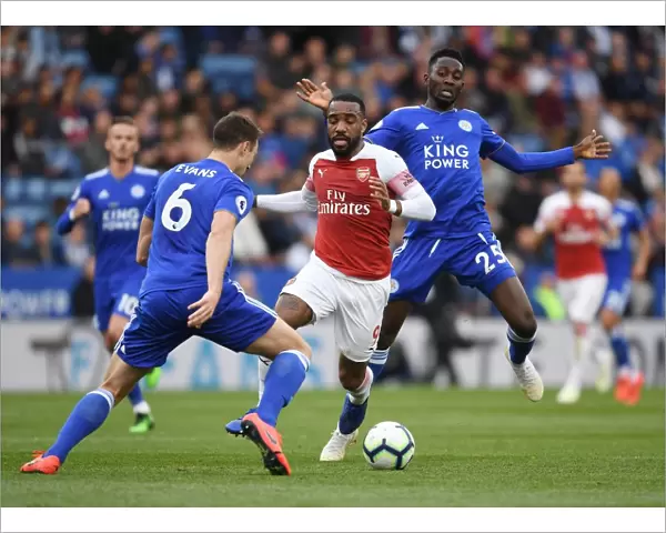 Arsenal's Lacazette Clashes with Leicester's Evans and Ndidi in Premier League Showdown