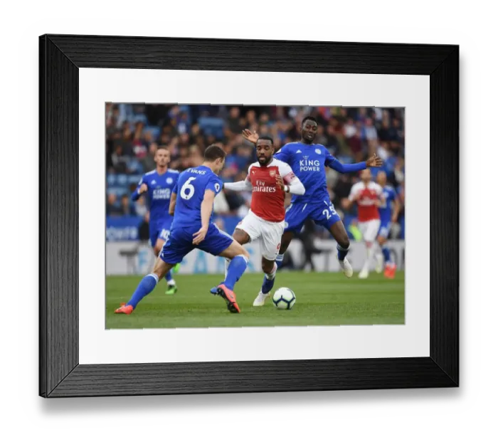 Framed Print : Arsenal's Lacazette Clashes with Leicester's Evans and Ndidi in Premier League Showdown Framed Print : Arsenal's Lacazette Clashes with Leicester's Evans and Ndidi in Premier League Showdown