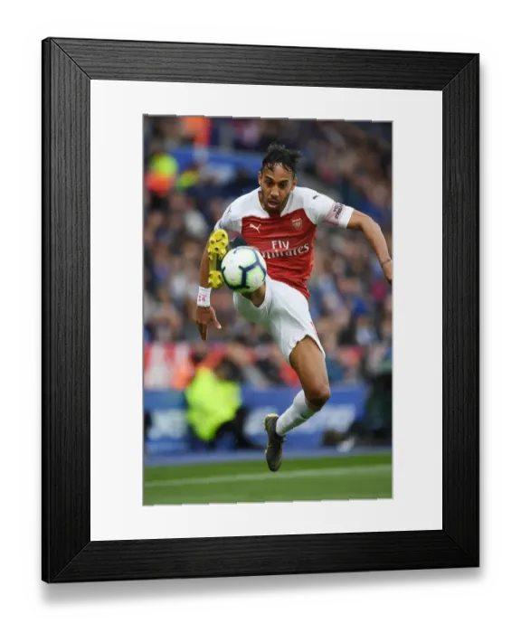 Framed Print : Arsenal's Aubameyang Goes Head-to-Head with Leicester City in Premier League Battle