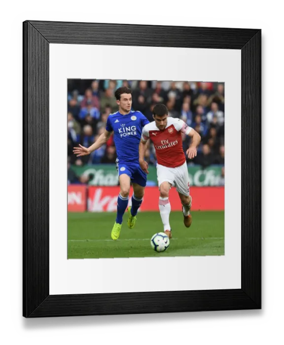 Framed Print : Leicester vs. Arsenal: Kolasinac Tripped by Chilwell in Intense Premier League Clash (2018-19)