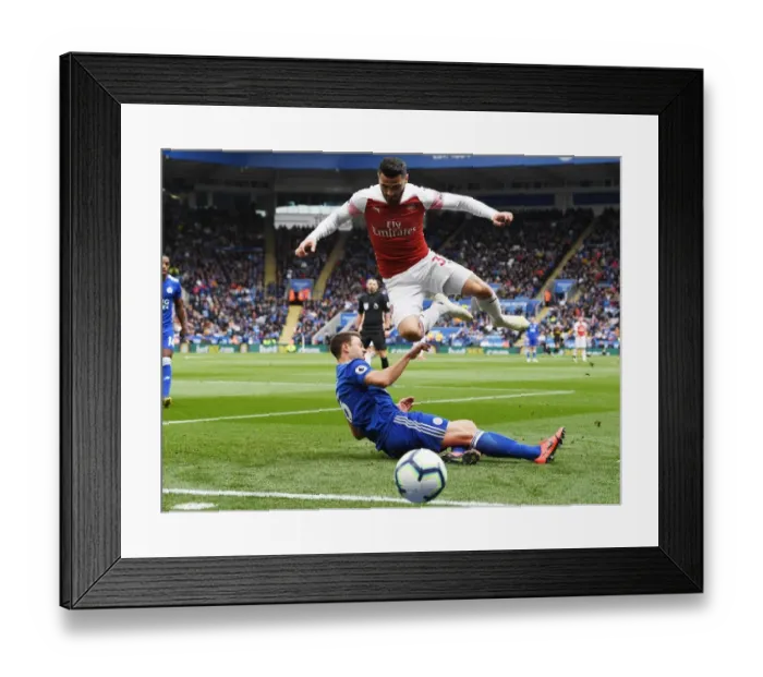 Framed Print : Clash at The King Power: Leicester vs. Arsenal, Premier League 2018-19 - Evans vs. Kolasinac Framed Print : Clash at The King Power: Leicester vs. Arsenal, Premier League 2018-19 - Evans vs. Kolasinac
