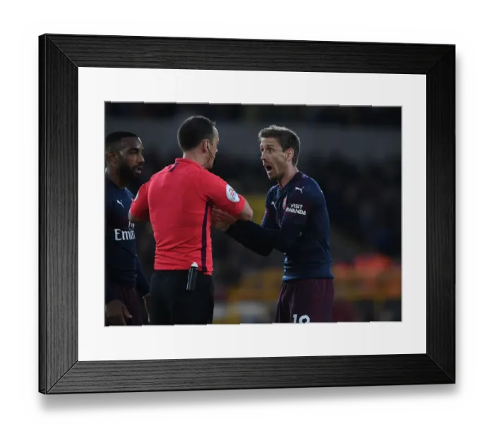 Framed Print : Nacho Monreal Confronts Referee during Tense Wolverhampton Wanderers vs. Arsenal FC Premier League Clash Framed Print : Nacho Monreal Confronts Referee during Tense Wolverhampton Wanderers vs. Arsenal FC Premier League Clash