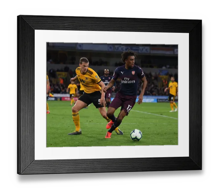 Framed Print : Intense Battle: Iwobi vs Bennett - Arsenal's Premier League Showdown vs Wolverhampton Wanderers (2018-19)