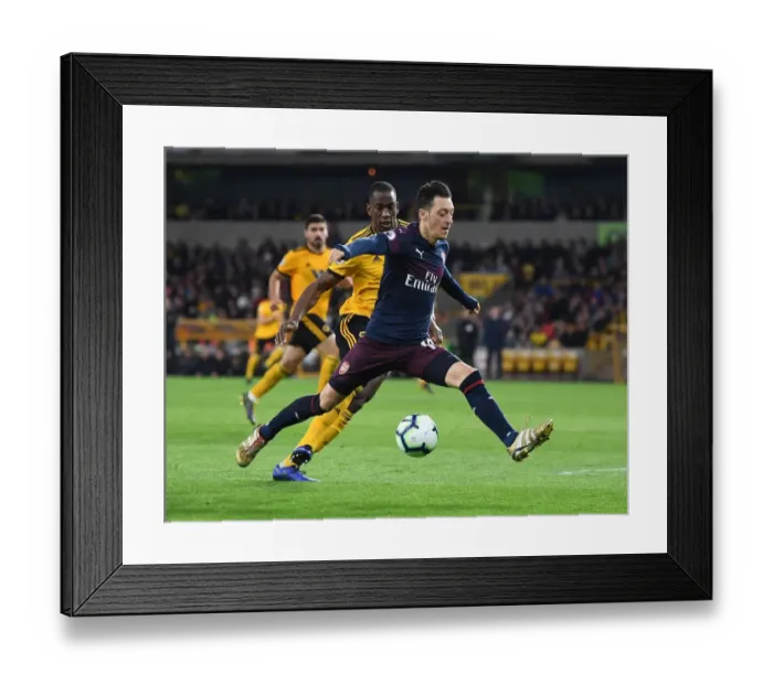 Framed Print : Mesut Ozil Under Pressure: Willy Boly Closes In during Wolverhampton Wanderers vs. Arsenal FC, Premier League 2018-19 Framed Print : Mesut Ozil Under Pressure: Willy Boly Closes In during Wolverhampton Wanderers vs. Arsenal FC, Premier League 2018-19