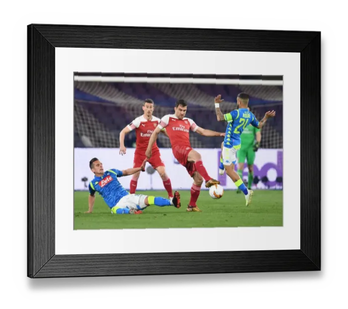Framed Print : Sokratis Faces Off Against Milik and Chiriches in Intense Napoli vs. Arsenal Europa League Clash