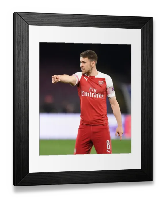 Framed Print : Arsenal's Aaron Ramsey Clashes with Napoli in Europa League Quarterfinals