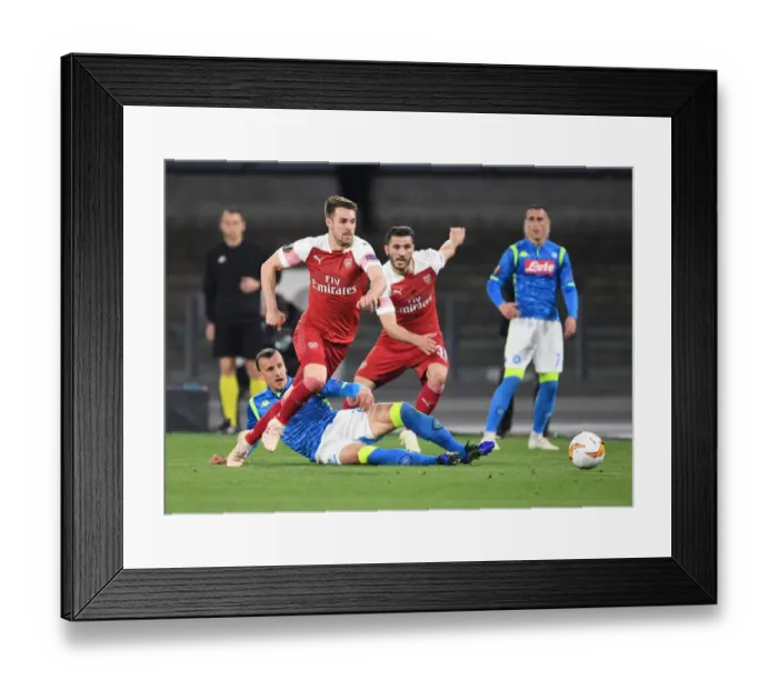 Framed Print : Arsenal's Aaron Ramsey Faces Off in Midfield Battle against Napoli in Europa League Quarterfinals