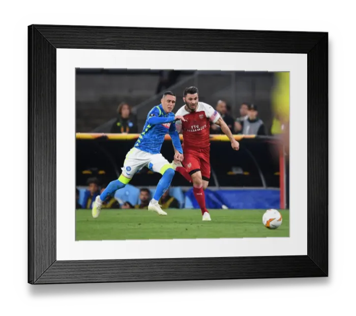 Framed Print : Arsenal's Sead Kolasinac Battles Past Napoli's Jose Callejon in Europa League Quarterfinal Framed Print : Arsenal's Sead Kolasinac Battles Past Napoli's Jose Callejon in Europa League Quarterfinal