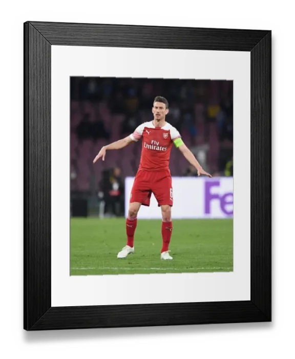 Framed Print : Laurent Koscielny in Action: Arsenal vs. Napoli - UEFA Europa League Quarterfinals (2018-19) Framed Print : Laurent Koscielny in Action: Arsenal vs. Napoli - UEFA Europa League Quarterfinals (2018-19)