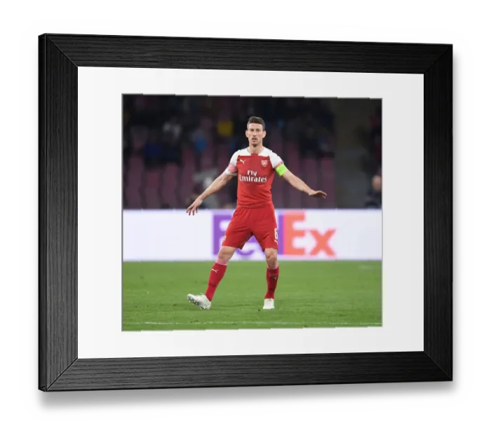 Framed Print : Arsenal's Koscielny in Action: Europa League Showdown against Napoli, 2019 Framed Print : Arsenal's Koscielny in Action: Europa League Showdown against Napoli, 2019