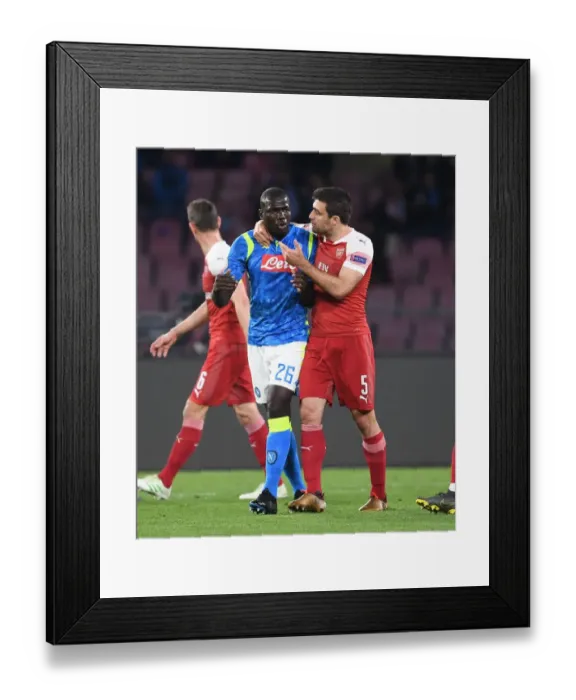 Framed Print : Sokratis vs. Koulibaly: Clash of the Europa League Titans - Arsenal vs. Napoli