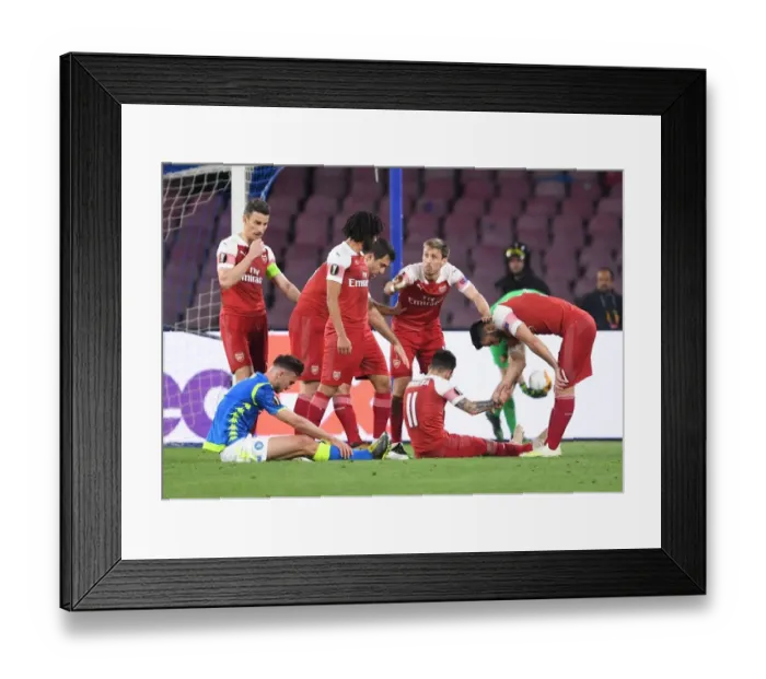 Framed Print : Arsenal Players Gather for Pre-Match Huddle against Napoli in Europa League Quarterfinal