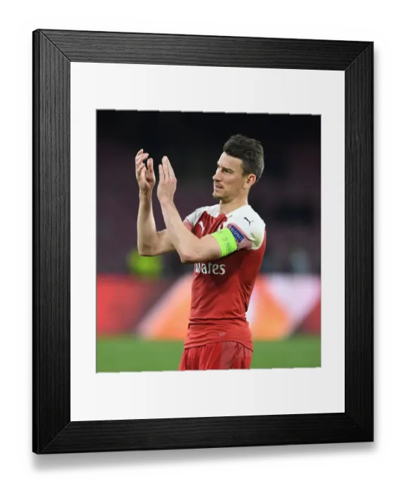 Framed Print : Laurent Koscielny's Farewell Applause: Arsenal's Europa League Battle at Napoli's Stadio San Paolo Framed Print : Laurent Koscielny's Farewell Applause: Arsenal's Europa League Battle at Napoli's Stadio San Paolo