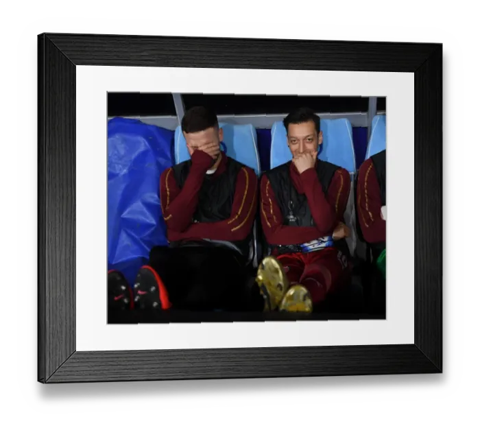 Framed Print : Arsenal's Mustafi and Ozil Pre-Match Huddle vs Napoli, UEFA Europa League Quarterfinals (2018-19)