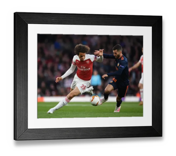 Framed Print : Arsenal's Matteo Guendouzi Outmaneuvers Valencia's Jose Gaya in UEFA Europa League Semi-Final Clash