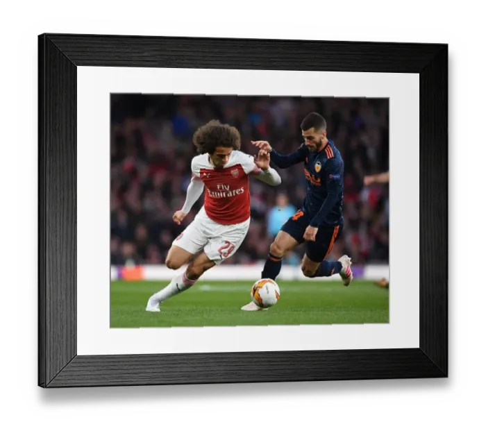 Framed Print : Arsenal's Matteo Guendouzi Battles Past Valencia's Jose Gaya in Europa League Semi-Final Showdown Framed Print : Arsenal's Matteo Guendouzi Battles Past Valencia's Jose Gaya in Europa League Semi-Final Showdown