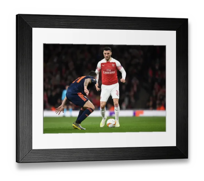 Framed Print : Arsenal vs Valencia: UEFA Europa League Semi-Final Showdown at Emirates Stadium, 2019 Framed Print : Arsenal vs Valencia: UEFA Europa League Semi-Final Showdown at Emirates Stadium, 2019