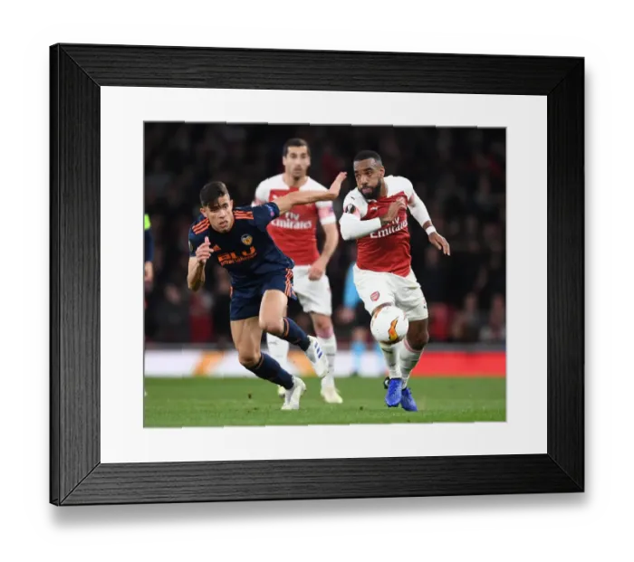 Framed Print : Alexis Lacazette's Powerful Performance: Arsenal's Europa League Semi-Final Battle Against Valencia Framed Print : Alexis Lacazette's Powerful Performance: Arsenal's Europa League Semi-Final Battle Against Valencia