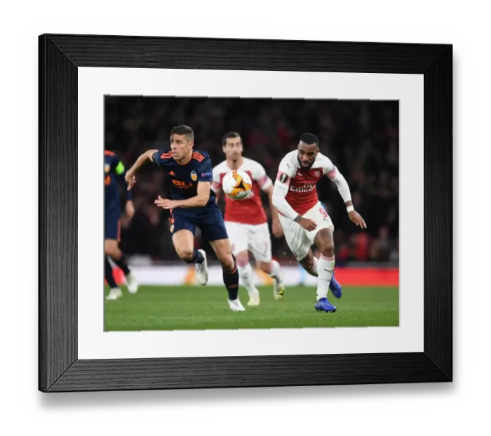 Framed Print : Arsenal's Alex Lacazette Battles Past Valencia's Gabriel in UEFA Europa League Semi-Final Showdown Framed Print : Arsenal's Alex Lacazette Battles Past Valencia's Gabriel in UEFA Europa League Semi-Final Showdown