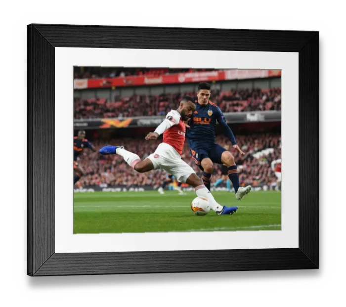 Framed Print : Arsenal vs Valencia: Alex Lacazette Faces Off Against Facundo Roncaglia in the 2018-19 Europa League Semi-Final First Leg Framed Print : Arsenal vs Valencia: Alex Lacazette Faces Off Against Facundo Roncaglia in the 2018-19 Europa League Semi-Final First Leg