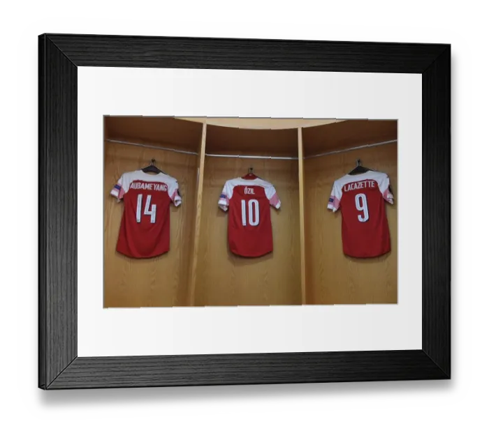 Framed Print : Arsenal's Aubameyang, Ozil, and Lacazette: Pre-Match Uniforms in the Changing Room (Arsenal v Valencia, UEFA Europa League Semi-Final, 2018-19)