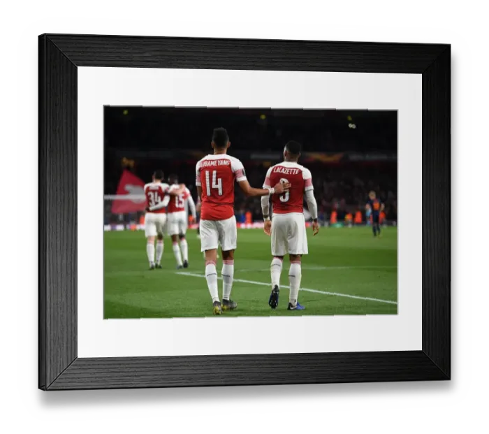 Framed Print : Arsenal's Aubameyang and Lacazette: Unstoppable Duo Celebrates Goals in Europa League Semi-Final vs Valencia Framed Print : Arsenal's Aubameyang and Lacazette: Unstoppable Duo Celebrates Goals in Europa League Semi-Final vs Valencia