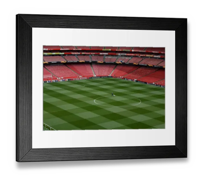Framed Print : Arsenal: Groundsmen Prepare for Europa League Semi-Final Showdown vs Valencia Framed Print : Arsenal: Groundsmen Prepare for Europa League Semi-Final Showdown vs Valencia