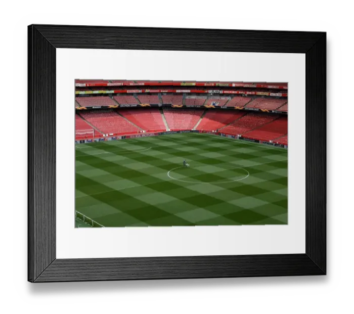 Framed Print : Arsenal: Groundsmen Ready the Pitch for Europa League Semi-Final Clash against Valencia