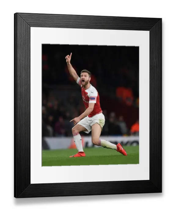 Framed Print : Arsenal's Shkodran Mustafi Focuses in UEFA Europa League Semi-Final vs Valencia