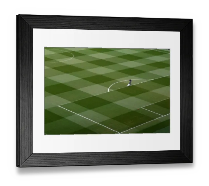 Framed Print : Arsenal's Groundsmen Prepare for Europa League Semi-Final Showdown vs Valencia Framed Print : Arsenal's Groundsmen Prepare for Europa League Semi-Final Showdown vs Valencia