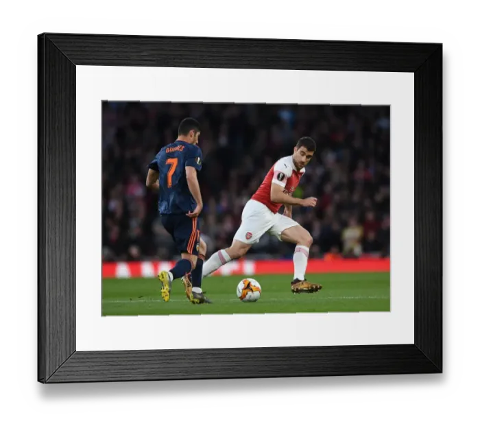 Framed Print : Arsenal vs Valencia: Sokratis Closes In on Goncalo Guedes in Europa League Semi-Final Showdown