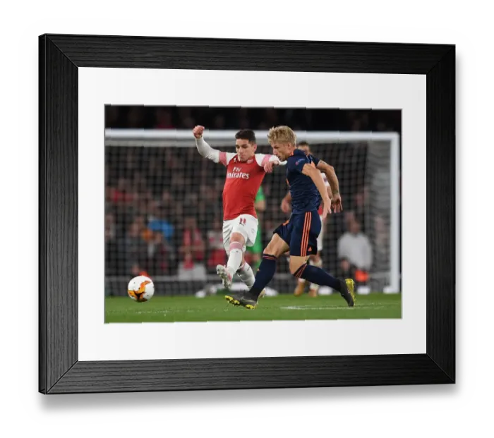 Framed Print : Arsenal vs Valencia: Torreira Closes Down Wass in Europa League Semi-Final Showdown Framed Print : Arsenal vs Valencia: Torreira Closes Down Wass in Europa League Semi-Final Showdown