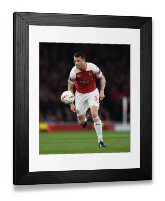 Framed Print : Granit Xhaka in Action: Arsenal vs Valencia, UEFA Europa League Semi-Final First Leg Framed Print : Granit Xhaka in Action: Arsenal vs Valencia, UEFA Europa League Semi-Final First Leg