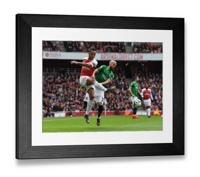 Framed Print : Arsenal's Aubameyang Faces Off Against Brighton's Bruno in Intense Premier League Clash