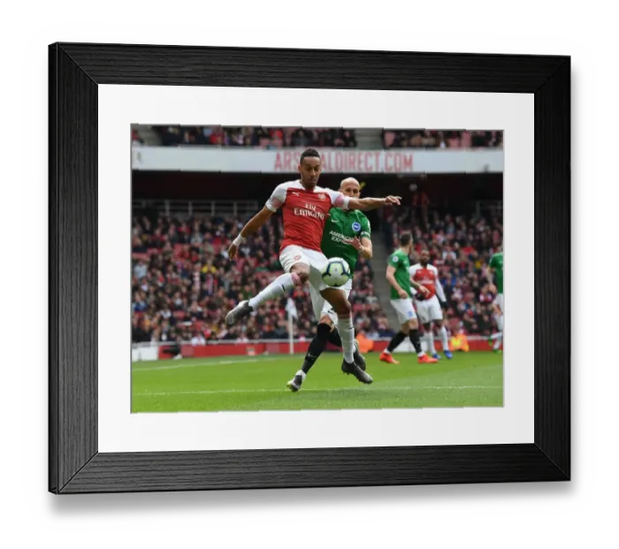 Framed Print : Aubameyang vs Bruno: Intense Clash Between Arsenal and Brighton in Premier League