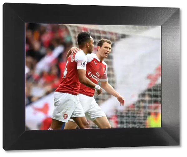 Arsenal's Aubameyang and Lichtsteiner Celebrate Goal Against Brighton & Hove Albion